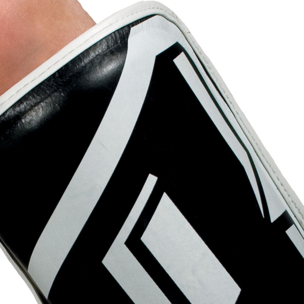 Close-up of the shin guard's white chevron graphic