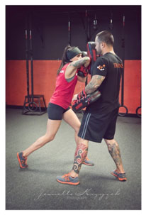 female fighter elbow sparring